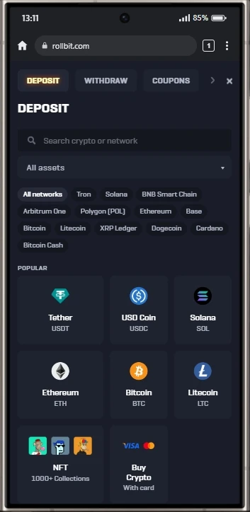 Rollbit mobile cashier showing all network filter chips and popular crypto assets