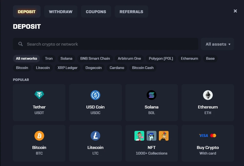 Rollbit cashier deposit screen with network filters and popular crypto assets